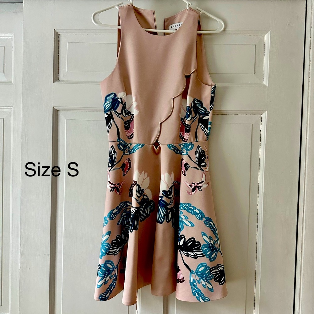 Boutique light pink dress with floral design